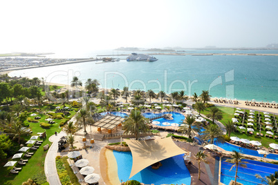 beach with a view on jumeirah palm man-made island, dubai, uae