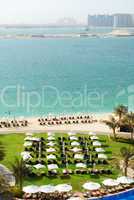 beach with a view on jumeirah palm man-made island, dubai, uae