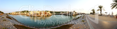 panorama of the luxury hotel during sunset and beach, ras al kha
