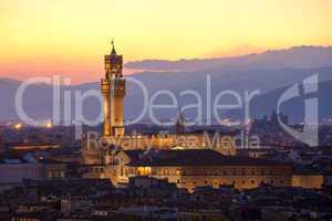 sunset view of the palazzo della signoria tower, florence