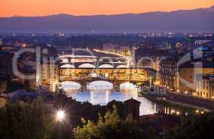 ponte vecchio night view over arno  river in florence