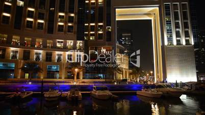 The night illumination of Dubai Marina. It is an artificial canal city, built along a two mile (3 km) stretch of Persian Gulf shoreline. Dubai, UAE