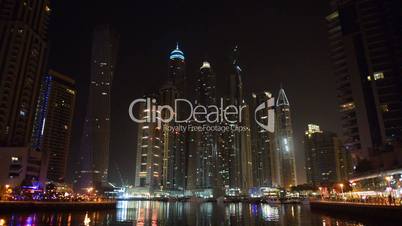 The night illumination of Dubai Marina. It is an artificial canal city, built along a two mile (3 km) stretch of Persian Gulf shoreline. Dubai, UAE