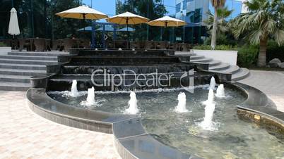 The fountains near outdoor terrace of luxury hotel, Dubai, UAE