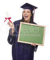 female graduate in cap and gown holding diploma,.blank chalkboar