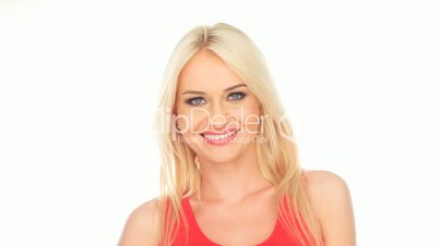 blonde woman smiling on white