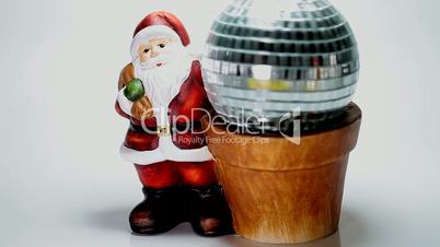Santa claus and a rotating glass ball