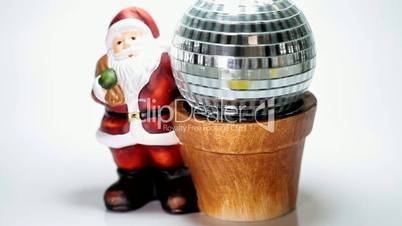 Santa claus and a rotating glass ball