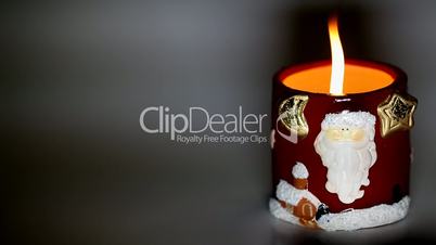 Santa claus with a candle