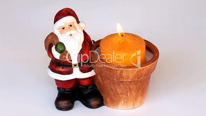 santa claus with a candle