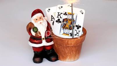 santa claus with poker cards