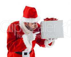 Young Santa Claus with gift box