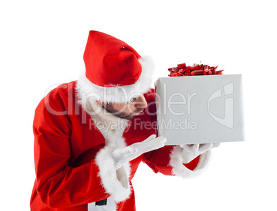 Young Santa Claus with gift box