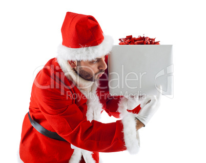 Young Santa Claus with gift box