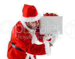 Young Santa Claus with gift box