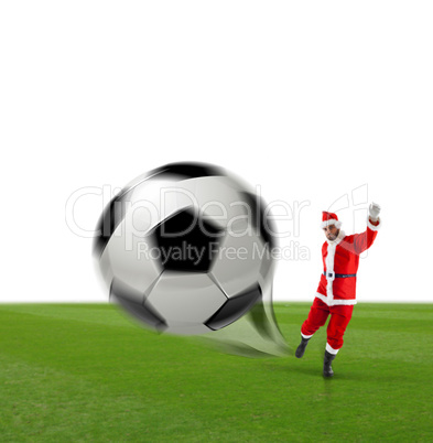 Santa Calus kicking a soccer ball