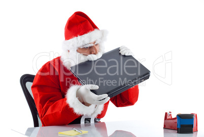 Young Santa Claus with notebook