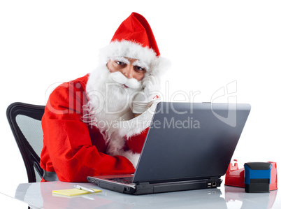 Young Santa Claus with notebook