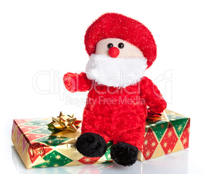 Colorful gift boxes with Santa Claus puppet