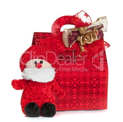 Gift red bag with Santa Claus puppet