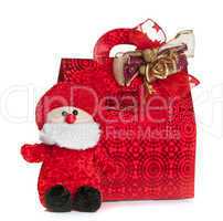 Gift red bag with Santa Claus puppet