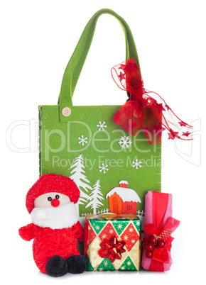 Cloth bag with Christmas decorations and gifts boxes