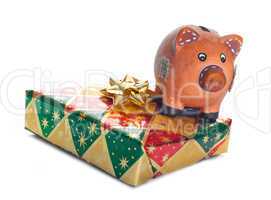 Colorful gift boxes with piggy bank