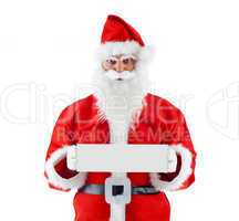 Young Santa Claus with signboard