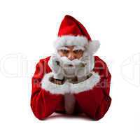 Santa Claus lying down with serious expression