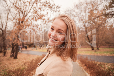 autumn portrait of a beautiful girl