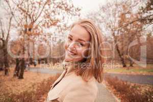 autumn portrait of a beautiful girl