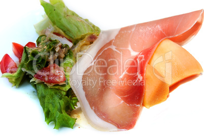 melon with ham and salad