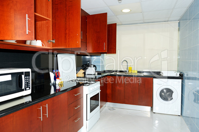 kitchen in the apartment of luxury hotel, dubai, uae