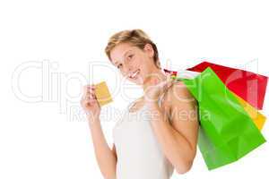 glückliche frau mit einkaufstüten und kredit karte