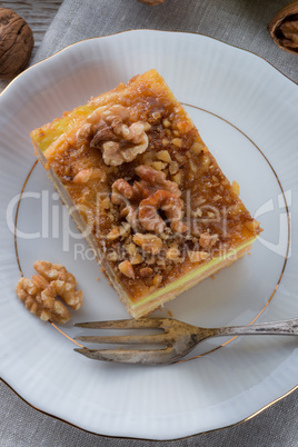 .apple strudel with vanilla pudding and nuts