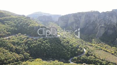 Panning of view from above on the Rousannou - St. Barbara monastery, Meteora,  Greece