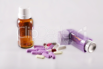 inhaler, syrup and capsules with a medicine