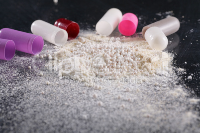 macro shot of powder by open pills