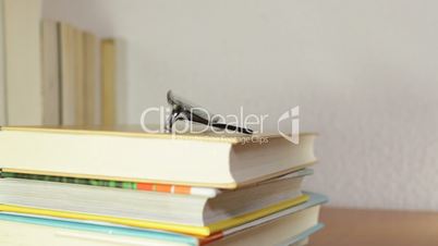 Books and eyeglasses