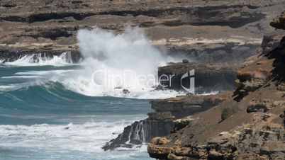 big waves crushing on rough coast 11161