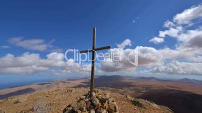 cross and time lapse clouds on top of the mountain pan 11171