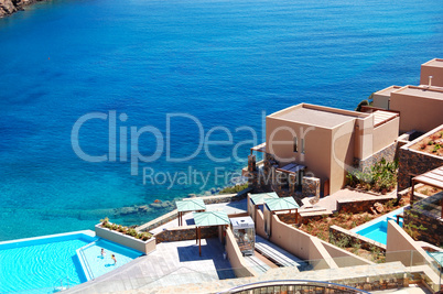 swimming pool with sea view at the luxury hotel, crete, greece