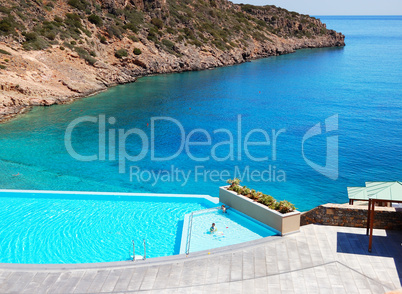 swimming pool with sea view at the luxury hotel, crete, greece