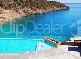 swimming pool with sea view at the luxury hotel, crete, greece