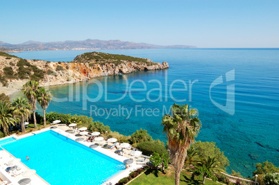 swimming pool at the beach of luxury hotel, crete, greece