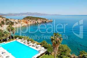 swimming pool at the beach of luxury hotel, crete, greece