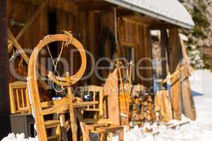 winter snow cottage wooden sledge outside