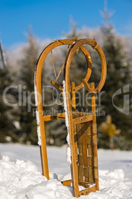 snow sledge standing in winter countryside