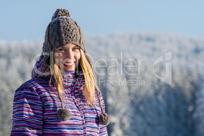 young woman portrait winter mountains snow