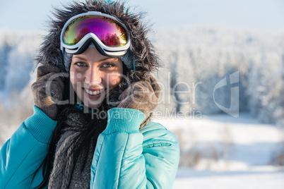 young woman in grey fur snow winter
